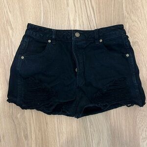Rolla’s Original Short in black distressed denim. Size 28